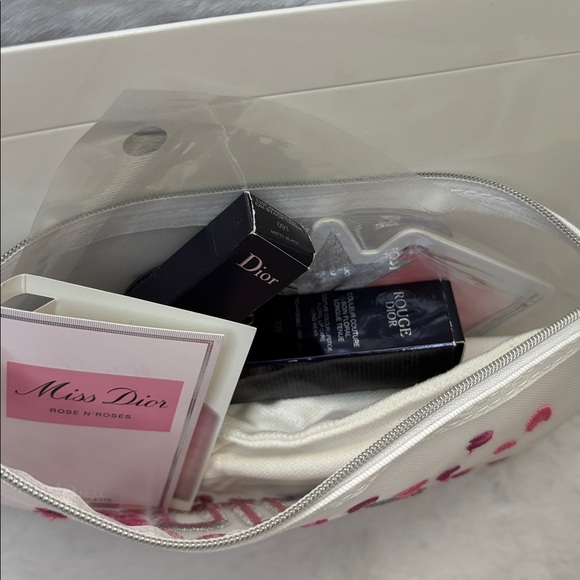 LOW START‼️Dior Red Lipstick, Eyeliner, Facial Samples, and White Mesh Pouch - Picture 6 of 7